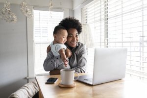 Mom working from home with toddler