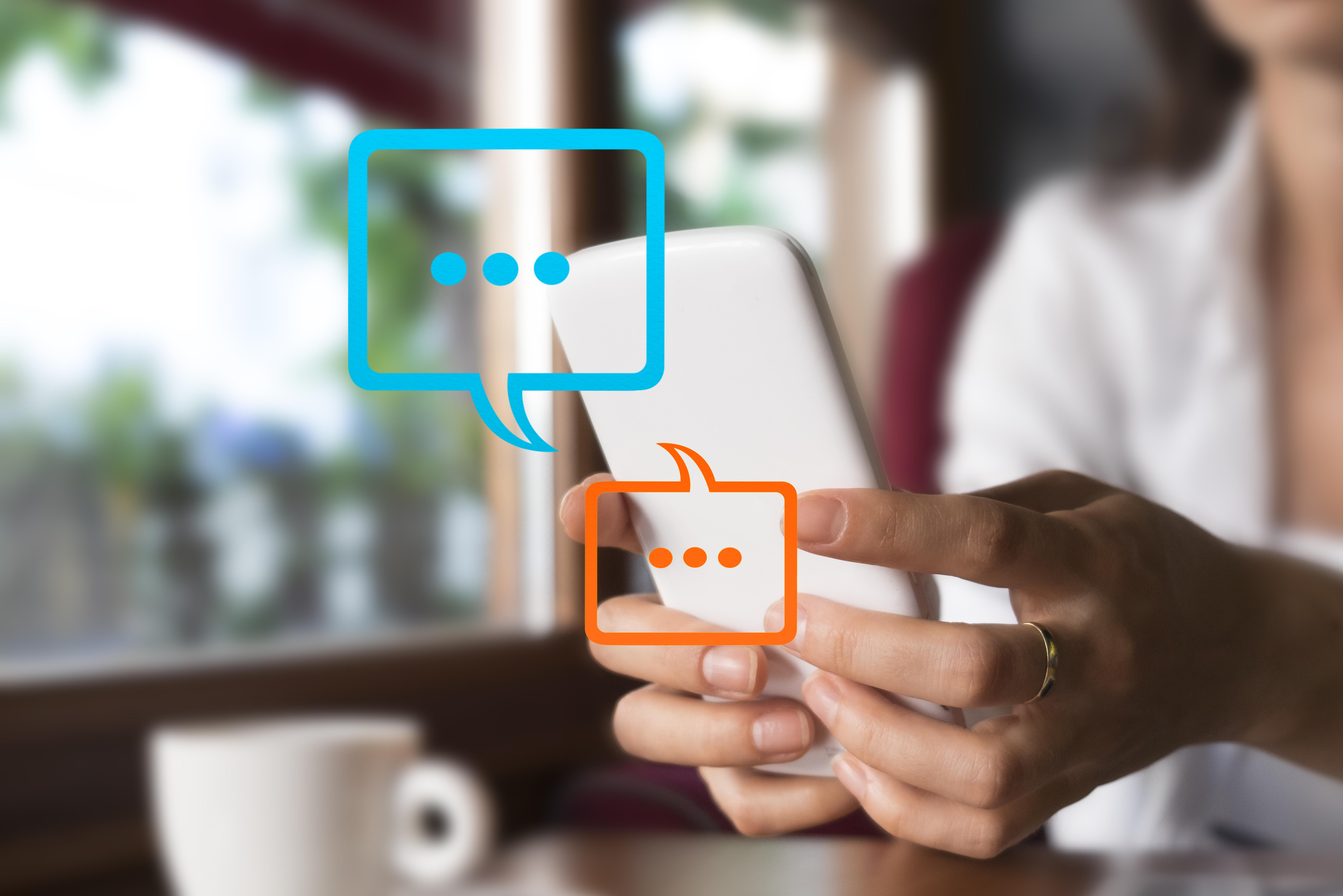 Women's hand typing on mobile smartphone, Live Chat Chatting on application Communication Digital Web and social network Concept. Work from home.